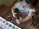 Игра с помпонами и