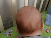 У сыночка головка не