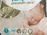 отдам подгузники pampers premium care